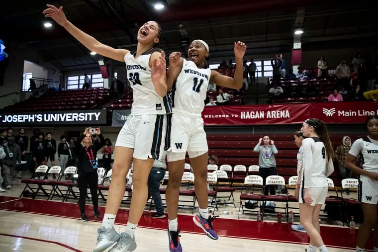 (left to right) Jordyn Palmer and Joniyah Bland-Fitzpatrick celebrate after winning the PAISAA Championship game at the Hagan Arena in Philadelphia, Pa. on Sunday, February 26, 2023. Westtown defeated Penn Charter 74 to 54.