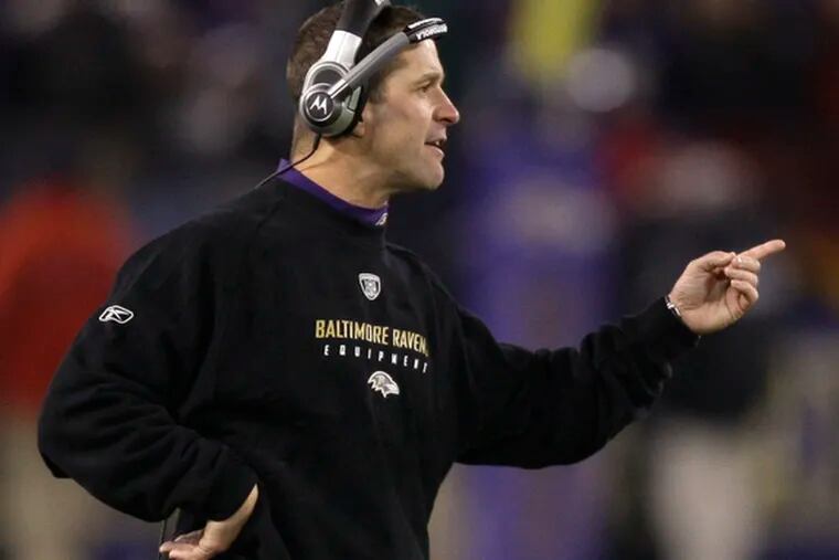 Ravens coach John Harbaugh argues call during game against Steelers.