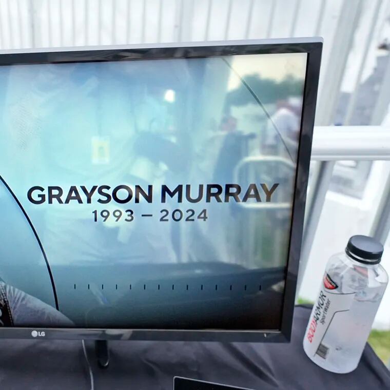 A golf television broadcast is played at the broadcast tent showing a photo of Grayson Murray during the third round of the Charles Schwab Challenge golf tournament at Colonial Country Club in Fort Worth, Texas, on Saturday.