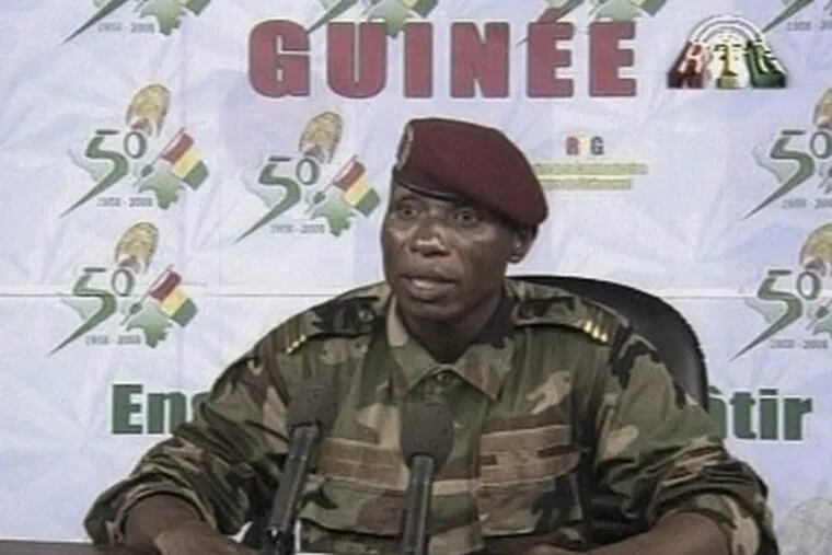 A spokesman for leaders of Guinea&#0039;s military-led coup readinga statement on national television yesterday.