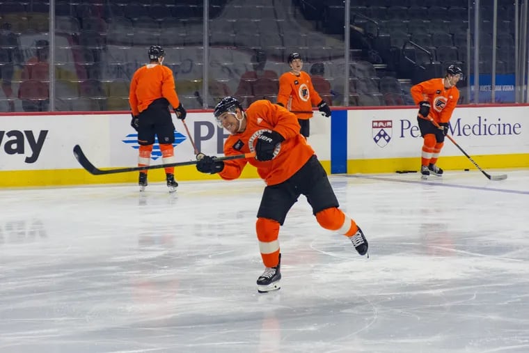 Philadelphia Flyers forward Cam Atkinson shoots during morning skate ahead of the game against the Florida Panthers on Saturday, Oct. 23, 2021 in the Wells Fargo Center.