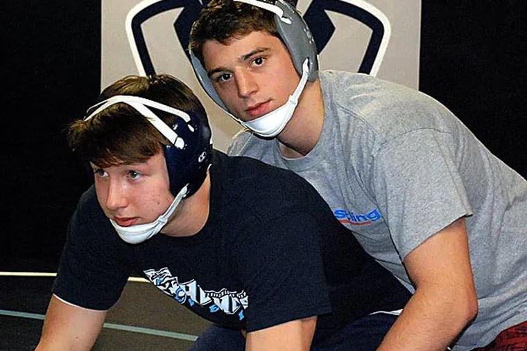 St. Augustine wrestler Jack Clark working out with teammate Jarred Hodges. (Handout photo)