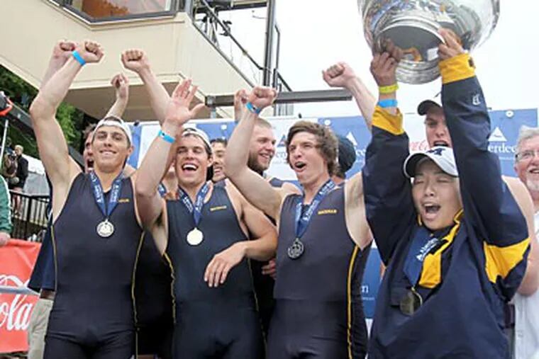 Michigan's varsity team celebrate after they won the men's heavyweight eight final at Dad Vail. (Charles Fox/Staff Photographer)