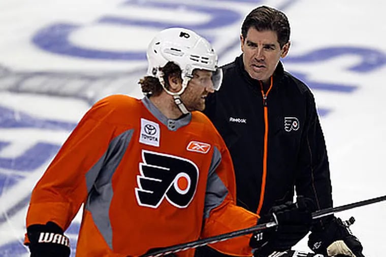 "I think we're more disciplined in what we do," Flyers coach Peter Laviolette said. (Yong Kim/Staff Photographer)