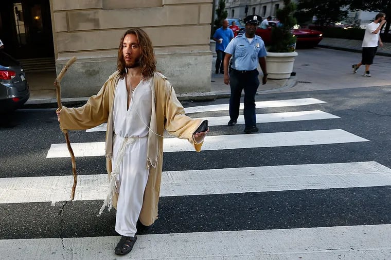 Michael Grant, also known as Philly Jesus, outside the Criminal Justice Center before his trial Wednesday on charges of trespassing and disorderly conduct.