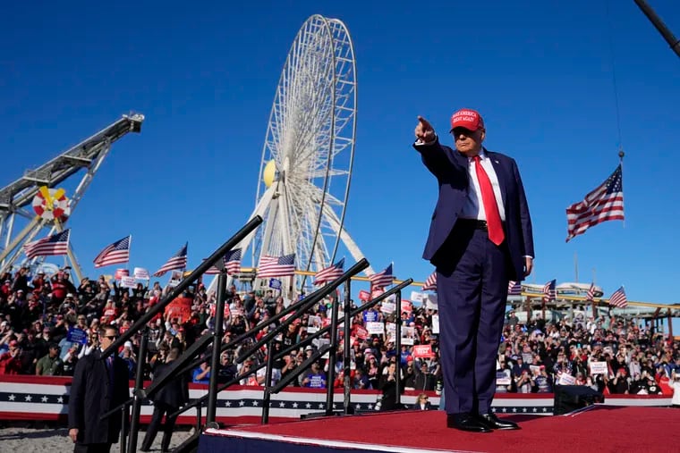 Republican presidential candidate former President Donald Trump gestures to the crowd during a campaign rally in Wildwood, N.J., Saturday, May 11, 2024.
