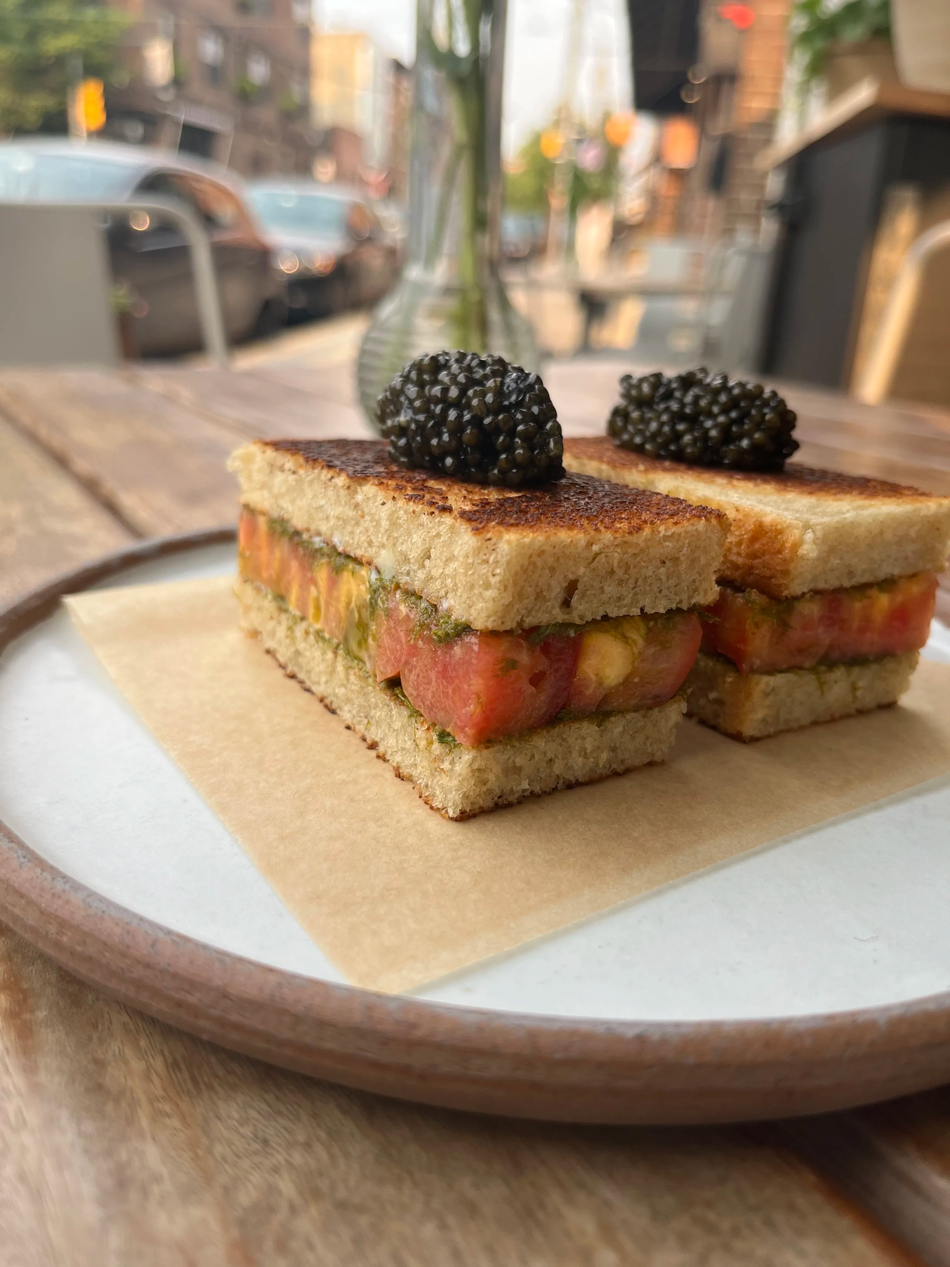 At River Twice on East Passyunk Avenue, caviar goes on top of the tomato sandwich.