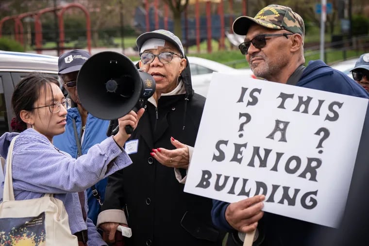 (Left to Right) Janna Goliff, Marguerite Byrd, and Ernesto Cooley, with the Renter’s Justice Collective during a protest against the living conditions they experience at Brith Sholom House apartments on Friday.