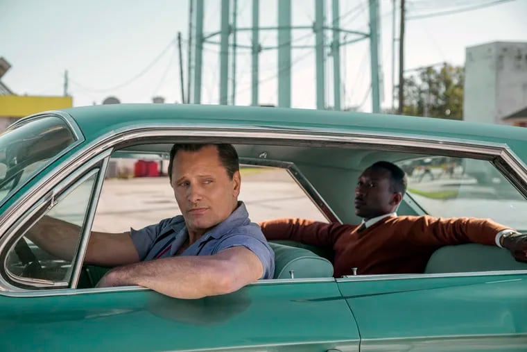 This image released by Universal Pictures shows Viggo Mortensen, left, and Mahershala Ali in a scene from "Green Book."Amid controversy from the family of Don Shirley, "Green Book" won the Academy Award for Best Picture at the 2019 ceremony.
