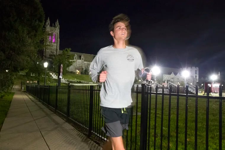 Ethan Widrig, a St. Josephâ€™s student is running a 5K every single day for 100 days to raise money for Alzheimer's awareness and research.  He usually runs at night. He is shown on Oct. 11, 2019.