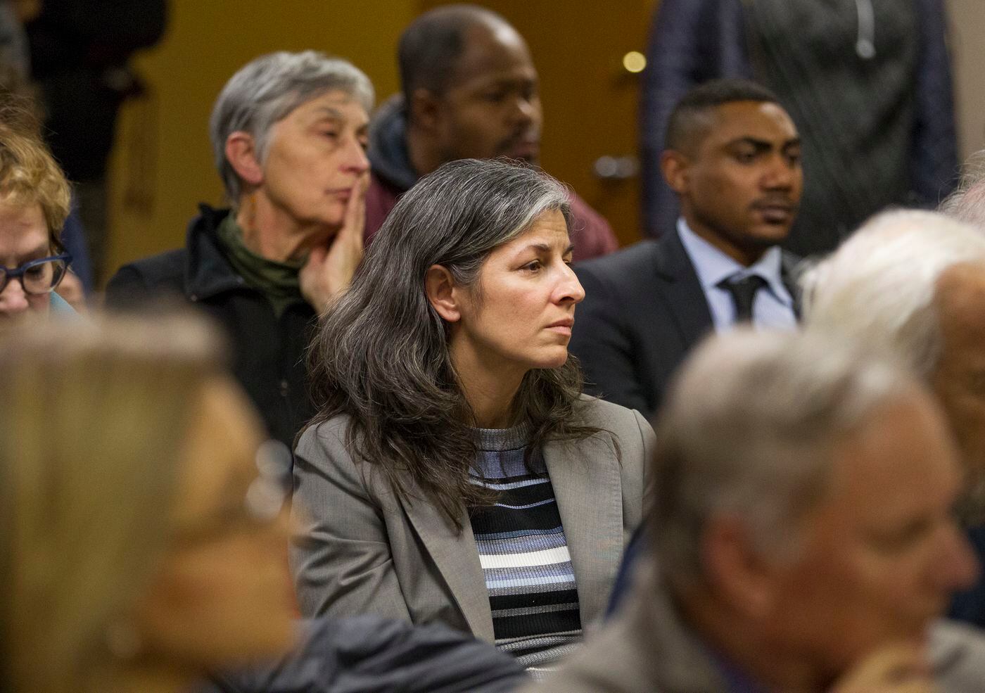 Muna Elshakhs, center, of Citizens for Better Elections, during a Philadelphia City Commissioners public hearing on voting machines Jan. 10, 2019.