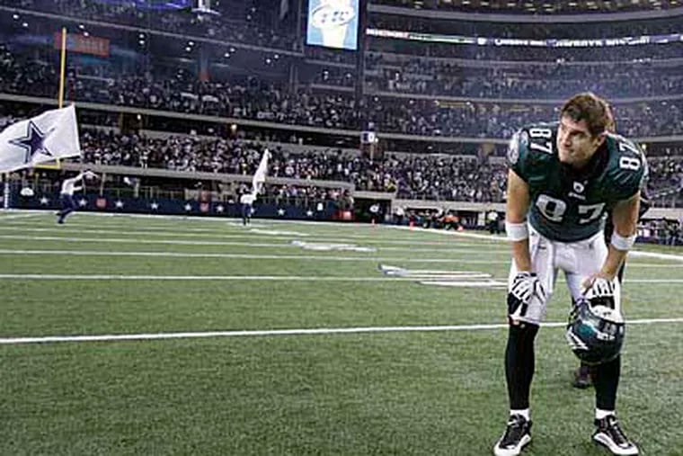 Brent Celek watches the Cowboys celebrate after beating the Eagles 34-14. (David Maialetti/Staff Photographer)