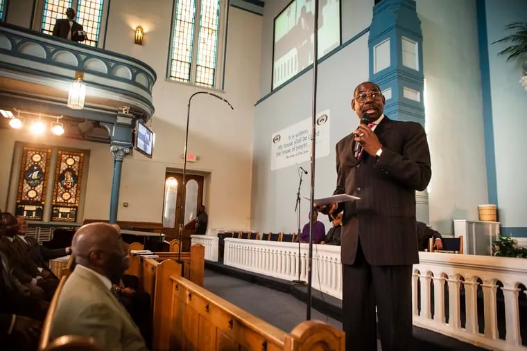 The Rev. Herb Lusk delivering a sermon at Greater Exodus Baptist Church on North Broad Street in January 2014.