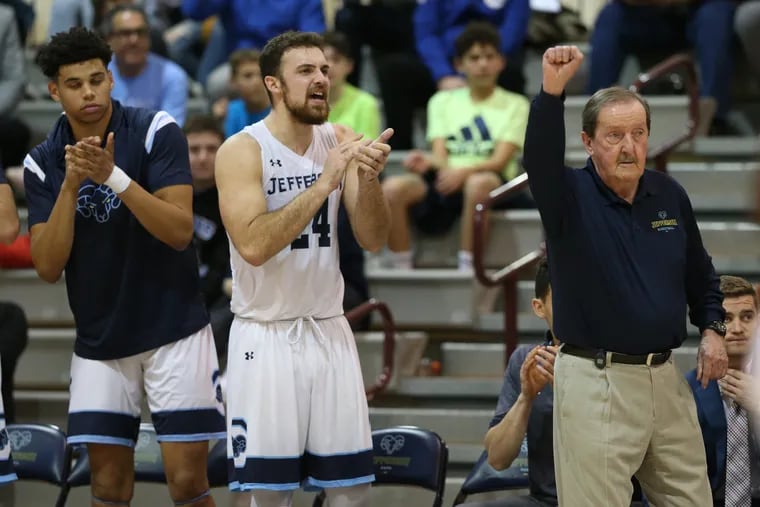 Coach Herb Magee of Jefferson University raises a fist after a made basket in the 2nd half of  their game against Kutztown on Nov. 19. You won't see Magee coaching in 2020.