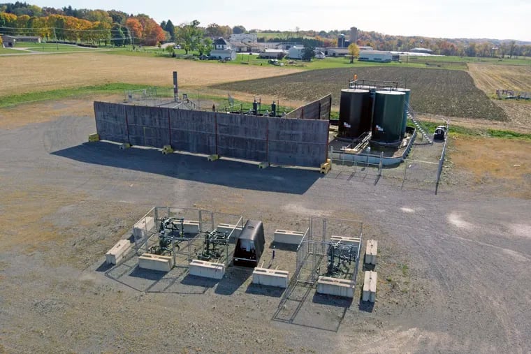 A photo taken from a drone shows the XTO Energy Marburger Farm Dairy natural gas fracking well pad in Evans City, Pennsylvania on Wednesday, October 14, 2020.