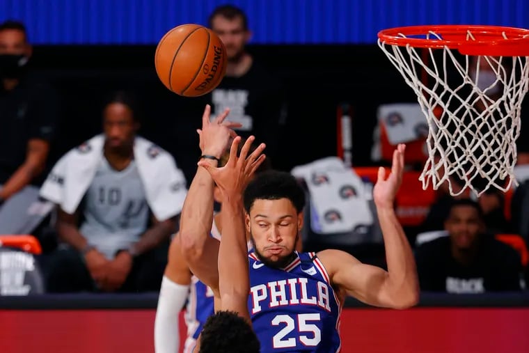The  76ers' Ben Simmons attempts to shoot against the San Antonio Spurs during the third quarter.