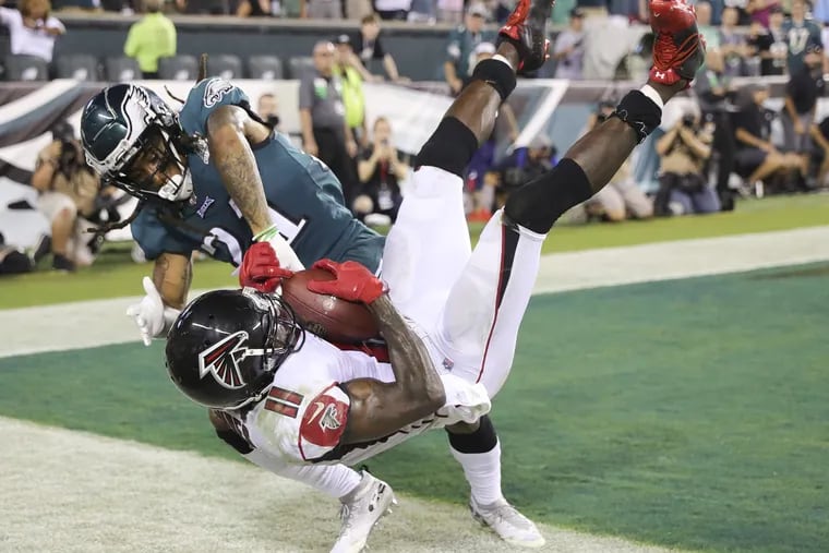 Eagles cornerback Ronald Darby pushes Atlanta Falcons wide receiver Julio Jones out of bounds on the final play of the game on Thursday, September 6, 2018. DAVID MAIALETTI / Staff Photographer