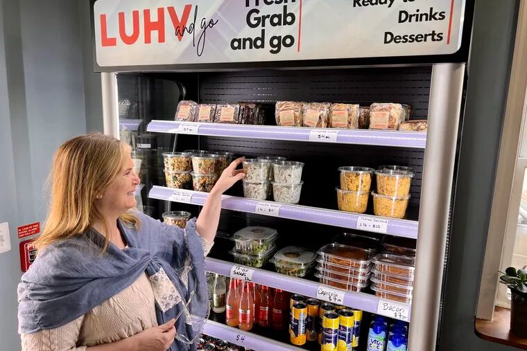 Owner Silvia Lucci at the grab-and-go refrigerator case at LUHV Vegan Bistro, 1131 S. 19th St.