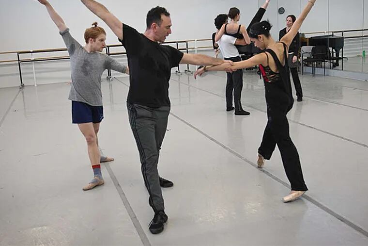 Choreographer Nicolo Fonte works with Pennsylvania Ballet dancers Alexander Peters and Mayora Pineiro. Fonte's piece &quot;Grace Action&quot; premieres, along with works by Larry Keigwin and William Forsythe. (Alejandro A. Alvarez / Staff Photographer)