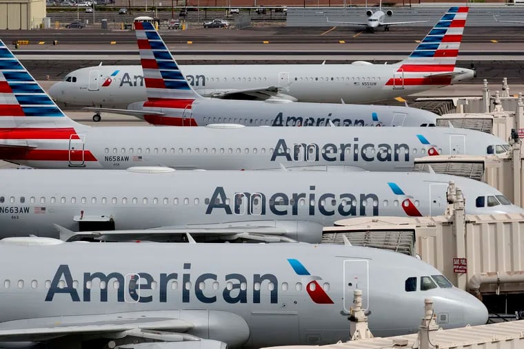 American Airlines jets sit idly at their gates at Phoenix's Sky Harbor International Airport in March.