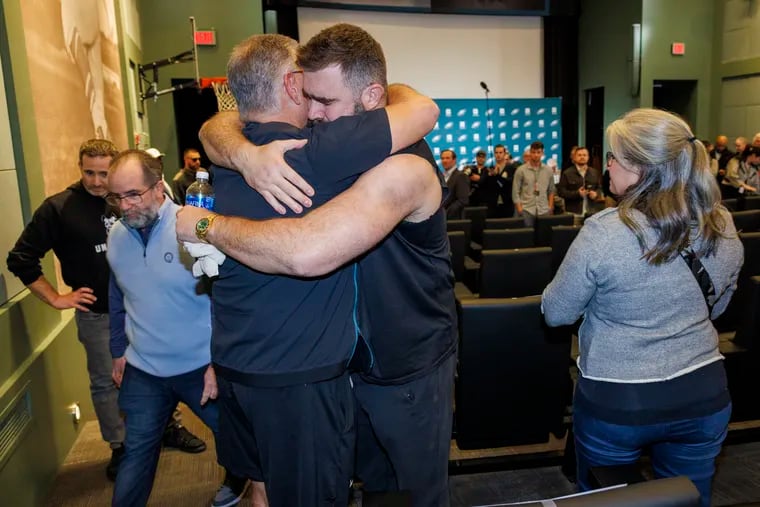 Jason Kelce hugs Eagles offensive line coach Jeff Stoutland after he announces his retirement at the Novacare Complex, in Philadelphia, Pa. on Monday, March 4, 2024.