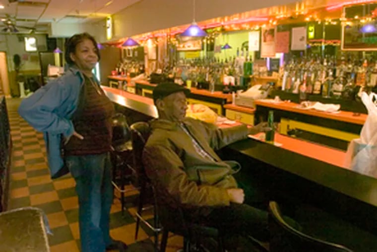 At Jess & Ron&#0039;s Place on Market Street, bartender Pat Jackson and patron Albert Smith discuss violence in the West Philadelphia neighborhood. &quot;Tell Rendell to bring in the National Guard,&quot; said Smith, 68.