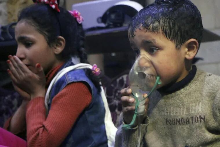A child received oxygen through respirators following an alleged poison gas attack in the rebel-held town of Douma, near Damascus, Syria.