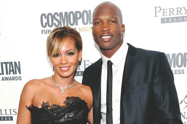 Chad Johnson (right) has been charged with domestic violence in an alleged attack on his new wife, Evelyn Lozada (left).



PHOTOS: ASSOCIATED PRESS
