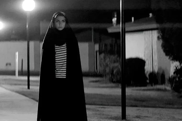Sheila Vand is a vampire in a chador who meets a James Dean-type guy amid sordid denizens in &quot;A Girl Walks Home Alone at Night.&quot; (Kino Lorber)