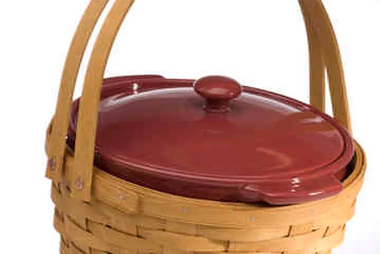 Casseroles travel safely to Thanksgiving dinner in this two-quart covered dish. Fits neatly into a woven wood basket, and the pair would make a nice gift to leave with the host.