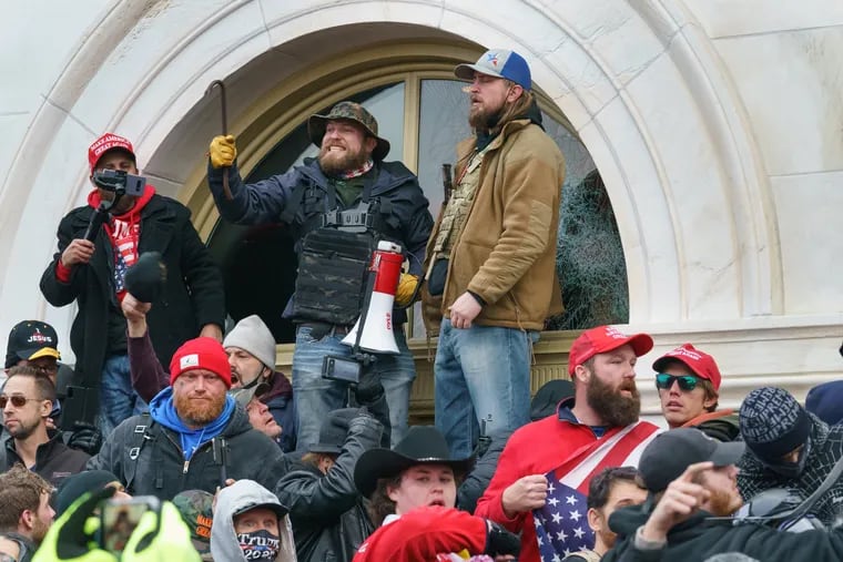 Pro-Trump supporters try to force their way into the Capitol building following a "Stop the Steal" rally on January 06, 2021 in Washington, DC.