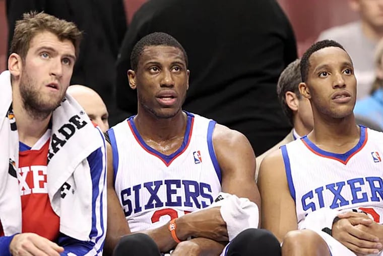 The Sixers' Spencer Hawes, Thaddeus Young and Evan Turner. (Yong Kim/Staff Photographer)