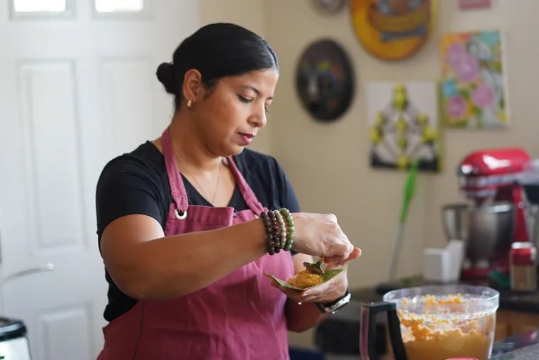 Jessica van Dop DeJesum makes a traditional Puerto Rican recipe in her kitchen after deciding to boycott GOYA foods.