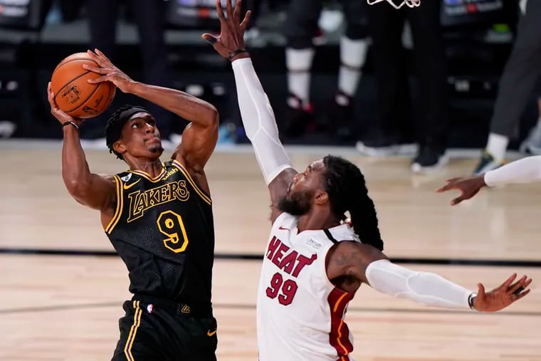 Lakers guard Rajon Rondo (left) shoots over Heat forward Jae Crowder in Game 5 of the NBA Finals earlier this month. Since 2006, Rondo has been the best selection at No. 21, where the Sixers will pick in the first round this year.