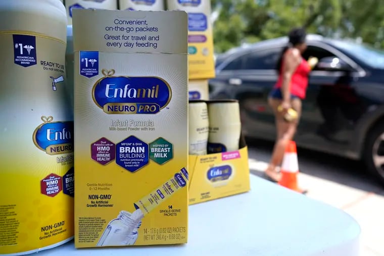 Katherine Gibson-Haynes helps distribute infant formula during a baby formula drive in Houston.