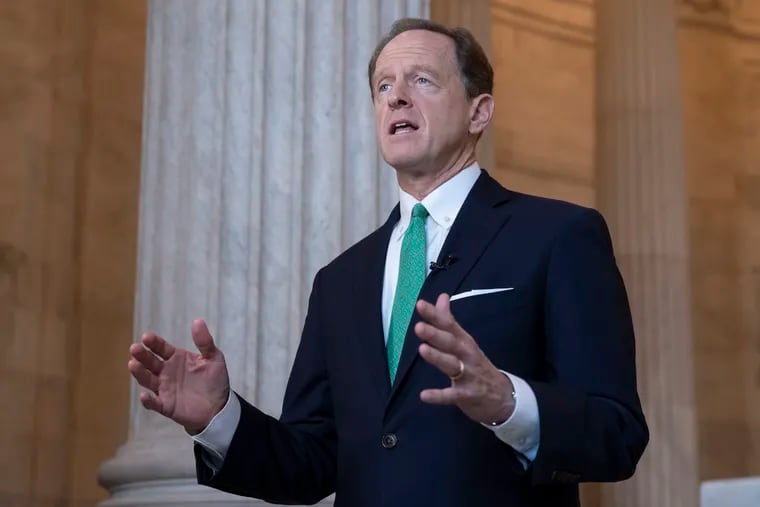 FILE - U.S. Sen. Pat Toomey waded into a budget fight in Pennsylvania on Monday over substantially expanding state taxpayer support for private and religious schools that is stoking pushback from public school advocates. (AP Photo/J. Scott Applewhite, file)