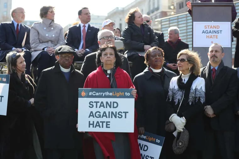 The Rev. Ruth Santana-Grace of the Presbytery of Philadelphia stands with other religious leaders at a "Stand Against Hate" rally at Independence Hall on March 12.