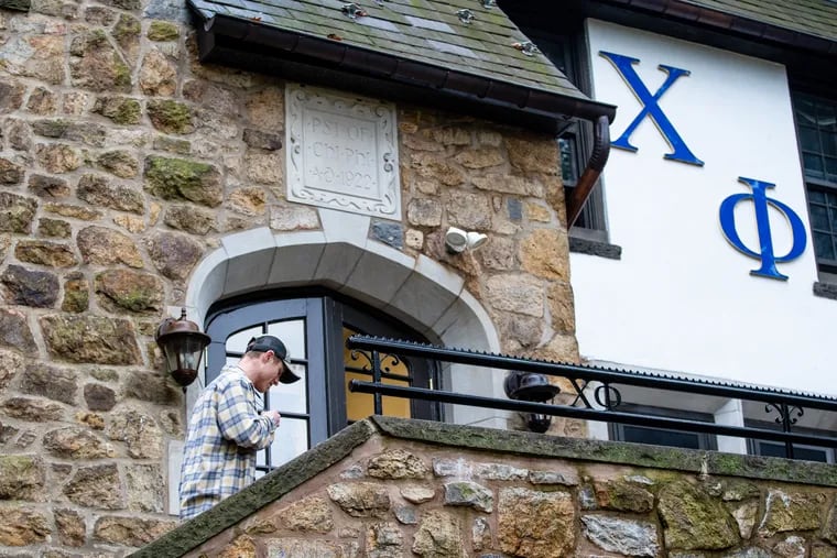 Matt Knowles, 19, a sophomore at Lehigh University, walks into his fraternity house in Bethlehem. He belongs to Chi Phi, the oldest fraternity at Lehigh and one that could be suspended if one more infraction occurs. Numbers of fraternity and sorority members have been declining at Lehigh.