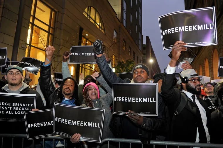 Supporters call for justice for imprisoned rapper Meek Mill during a rally outside the Criminal Justice Center November 13, 2017.