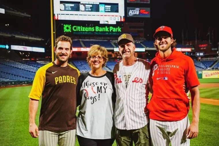 Austin, Stacie, A.J., and Aaron Nola, pictured after a Padres-Phillies game in Philadelphia in May 2022.