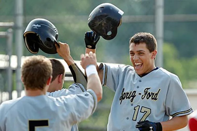 Spring-Ford's Mike Oczypok celebrates his two-run home run in the fourth inning. (Ron Cortes/Staff Photographer)