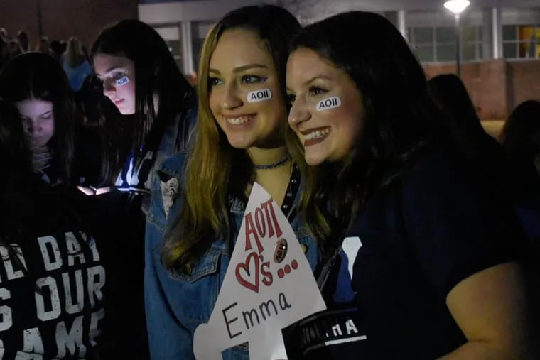 Gina Maiorana (left) a member of Alpha Omicron Pi at Penn State, who is from Blue Bell, celebrates Bid Day last week with new member, Emma Scalora (right), of West Orange, N.J. Courtesy of Lauren Eskin