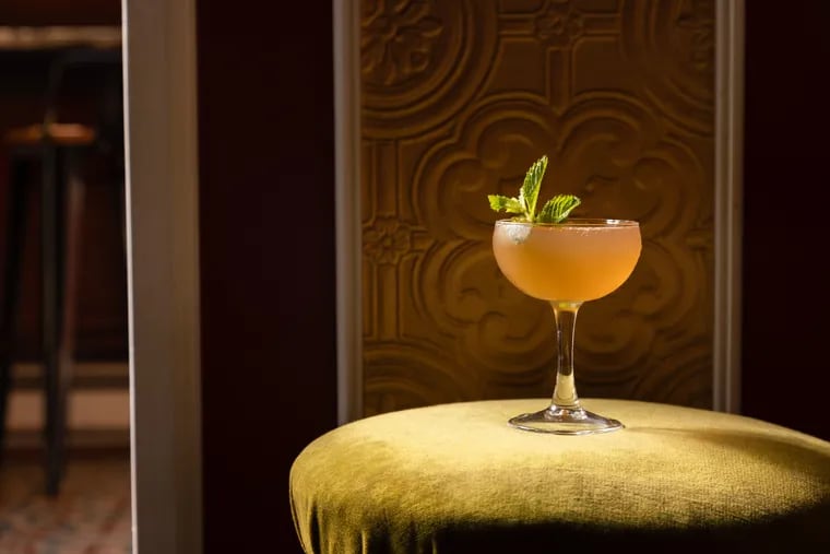 Bolo's Old Cuban, a mix of champagne, rum, lime juice, and mint leaves, is a wintery drink with a springy peach hue. Pantone Color Institute's 2024 Color of the Year is Peach Fuzz, it's 25th.