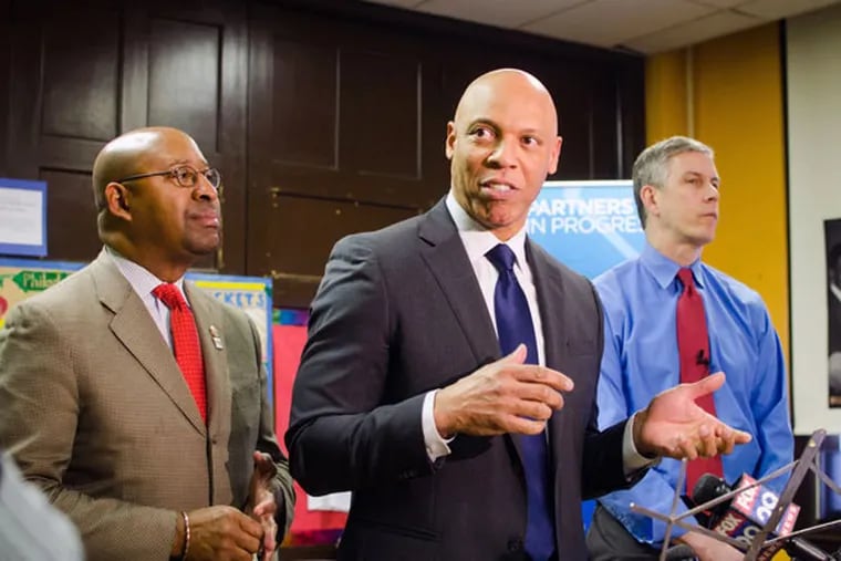 Mayor Michael Nutter (from left), Philly schools Superintendent William Hite and U.S. Secretary of Education Arne Duncan vist Stanton School on Friday, March 20, 2015, to discuss the state of Pennsylvania education. ( MEAGHAN POGUE / Staff Photographer)