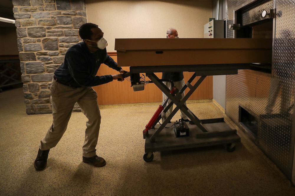 175 bodies in 2 days: Deluged with coronavirus victims, a Philadelphia cemetery aims to preserve the dignity of the dead