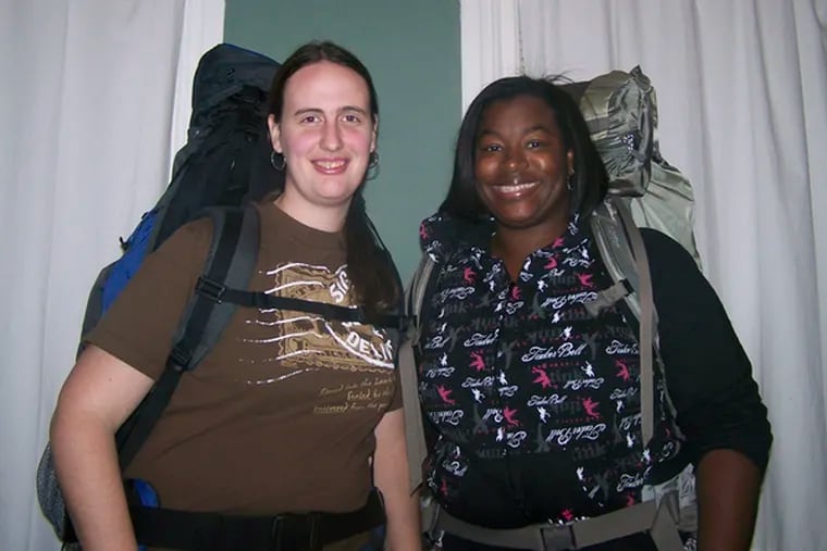 Samantha McCowan (left) of Media and Erica Talley of Overbrook are outfitted to go. The program they are joining includes periodic competitions, a la reality show &quot;The Amazing Race.&quot;