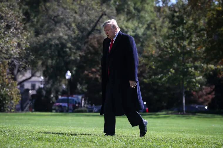 President Donald Trump walks on the South Lawn of the White House as he arrives to the White House after a trip to New York on Sunday, Nov. 3, 2019 in Washington, D.C. (Oliver Contreras/Sipa USA/TNS).