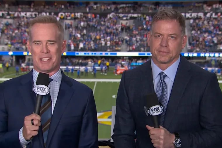 Troy Aikman (right) calling the NFC Championship game on Fox earlier this month alongside longtime broadcast partner Joe Buck. Aikman is reportedly leaving Fox after 20 years to join ESPN as the new analyst on "Monday Night Football."