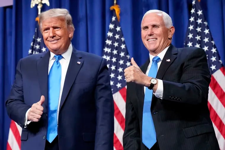 President Donald Trump and Vice President Mike Pence stand on stage during the first day of the 2020 Republican National Convention in Charlotte, N.C., Monday, Aug. 24, 2020.