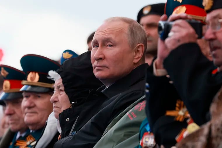 Russian President Vladimir Putin looks on during the Victory Day military parade marking the 77th anniversary of the end of World War II in Moscow, on Monday, May 9, 2022.